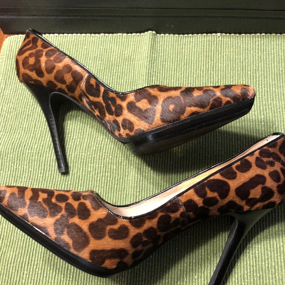 Michael Kors animal print pumps